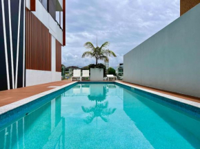 Stylish 1BR Apartment in Surfers, Pool, Gym